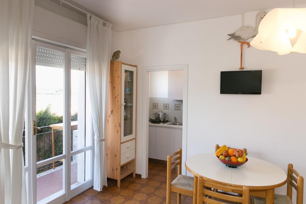 Talamone Apartment Værelse billede